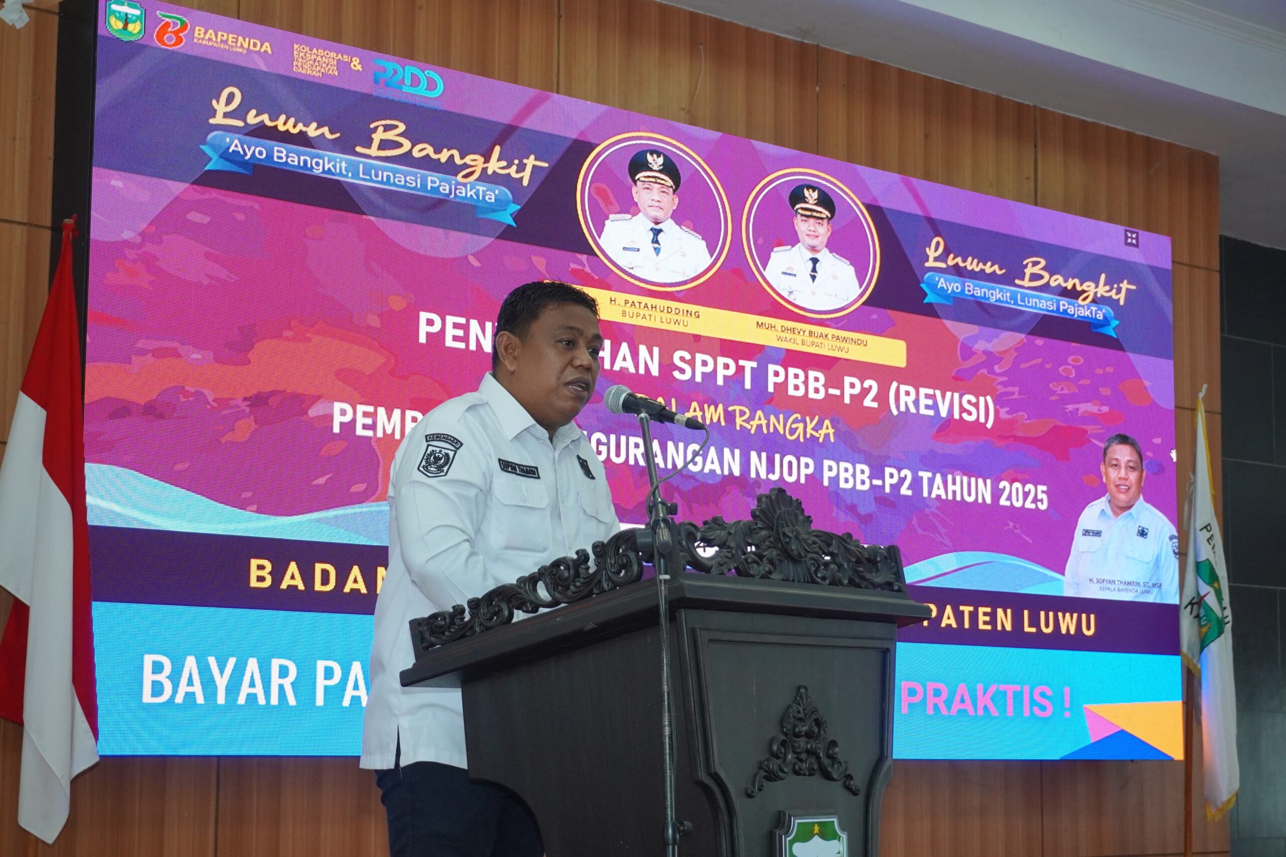 Bupati Luwu Serahkan SPPT PBB-P2 Revisi, Bapenda Laporkan Realisasi Pajak Bumi Bangunan